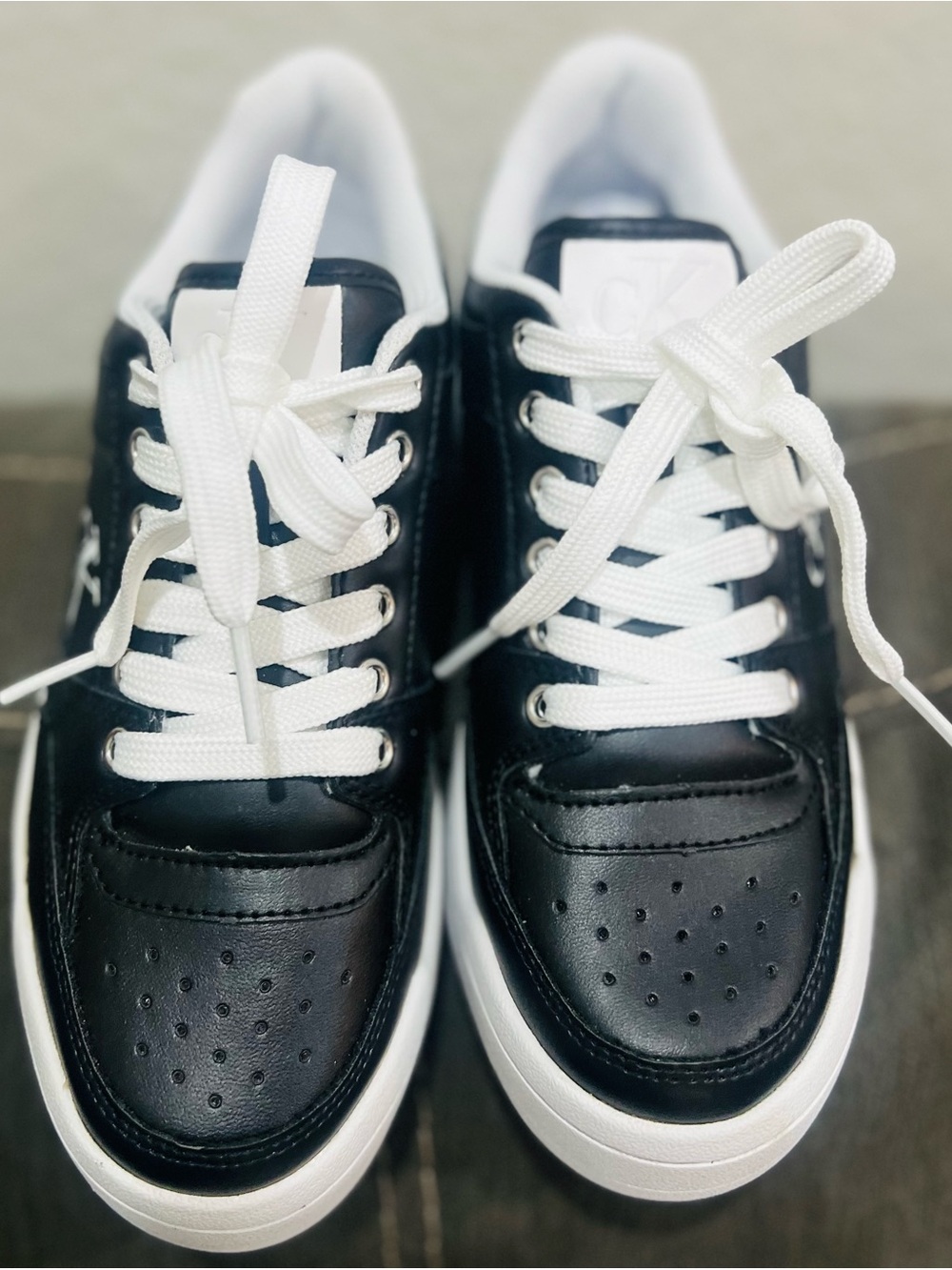 Calvin Klein women’s Black/White Sneakers